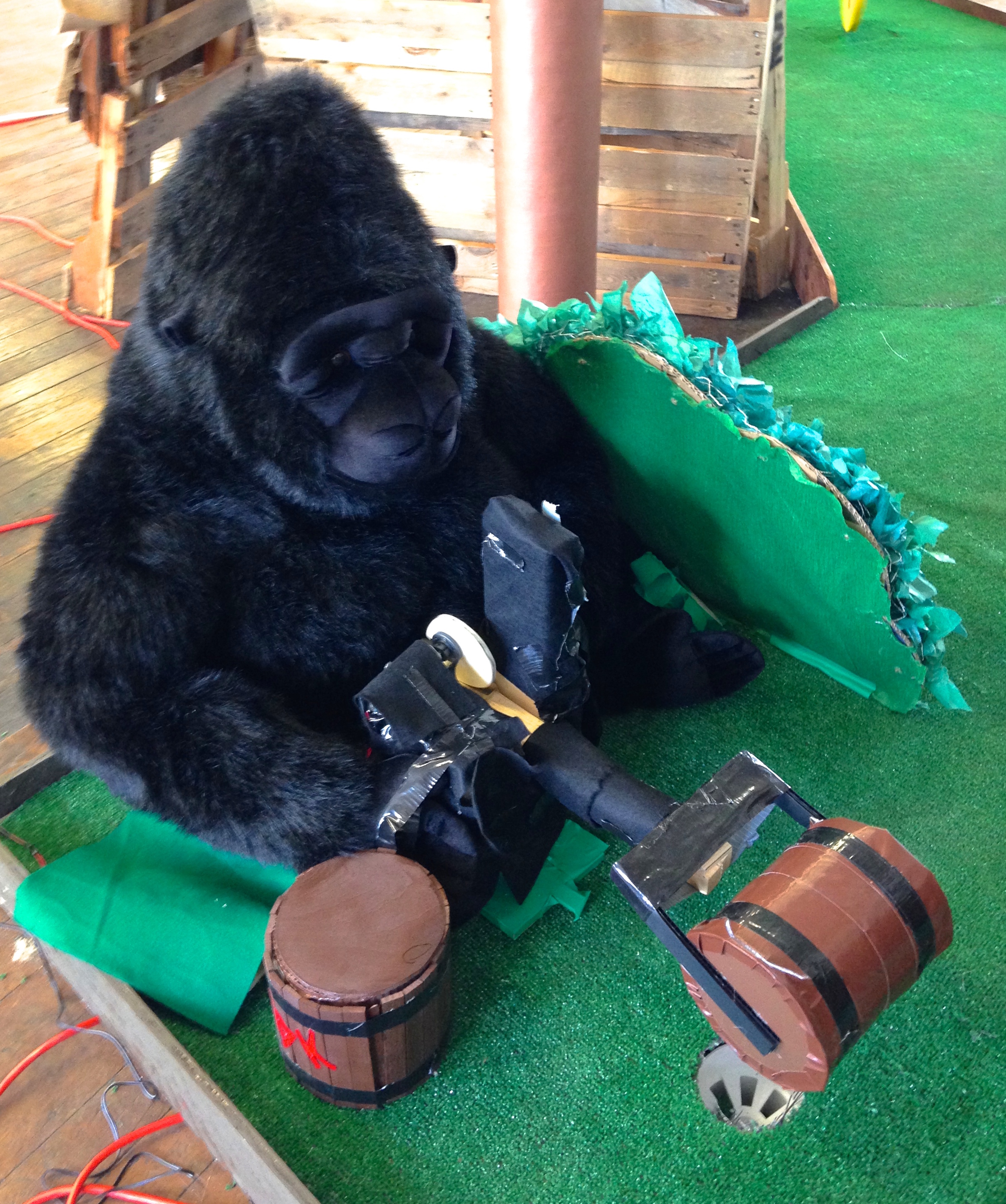 Donkey Kong slamming a barrel up and down over hole